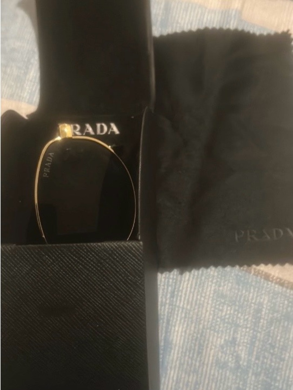 Prada Gold Framed Sunglasses with Black Lenses